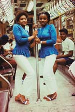 Jameel Shabazz, Two women in blue on the subway, 1980-1989, featured in Flava